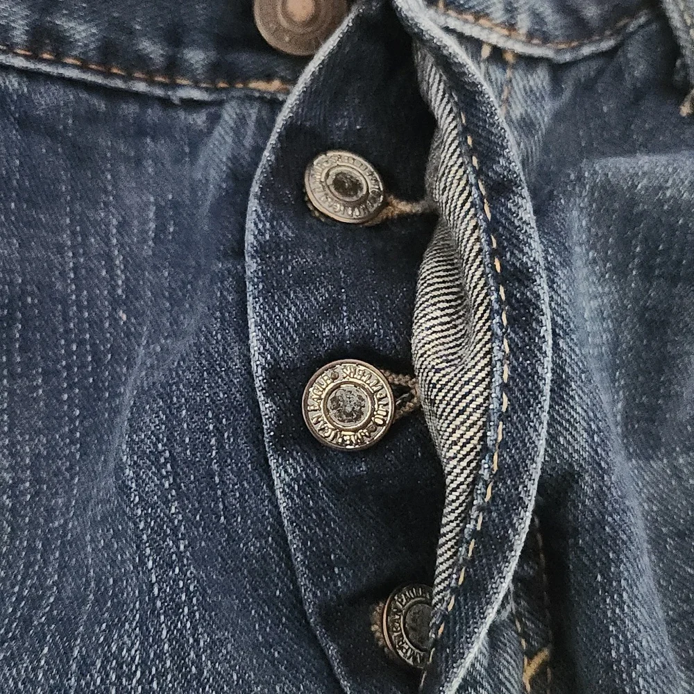 American Eagle Outfitters Men's Button Fly Low Rise Bootcut Distressed Jeans